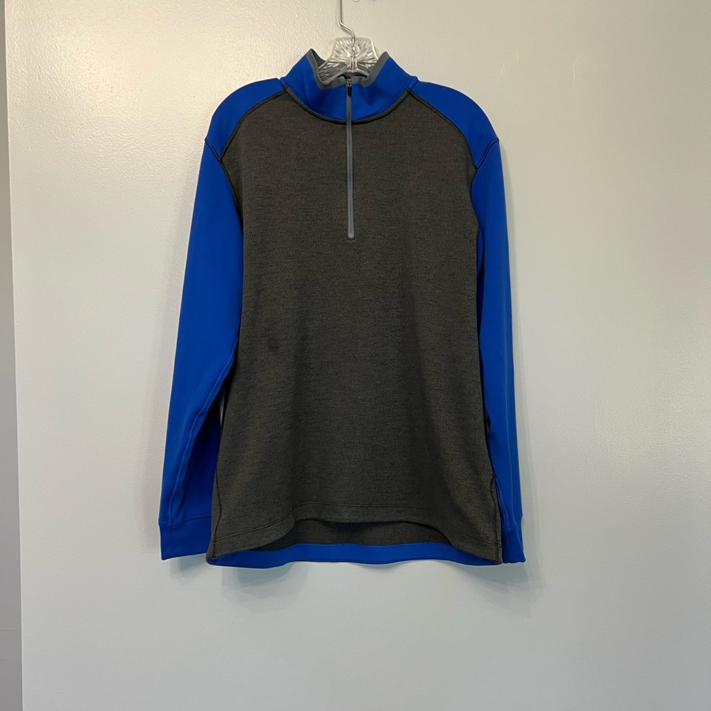Nike Golf Tour Performance Dri Fit Quarter Zip jacket.